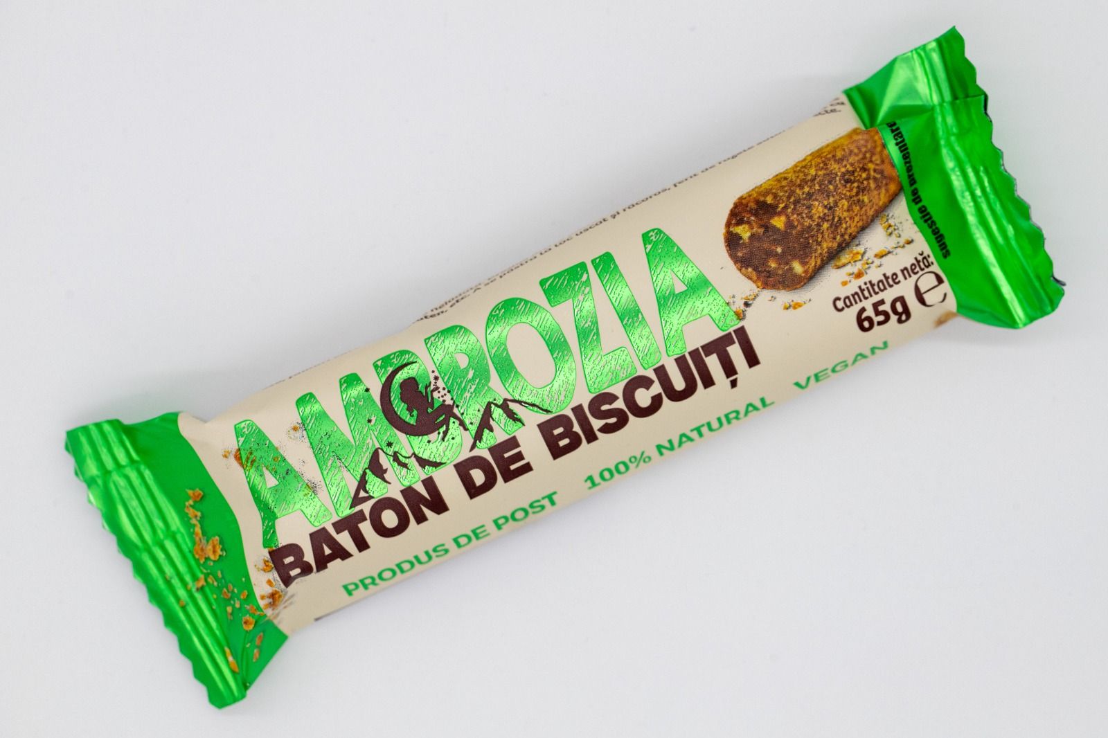 Baton de biscuiți Ambrozia, 65g, ambalaj crem cu detalii verzi și maro, 100% natural.