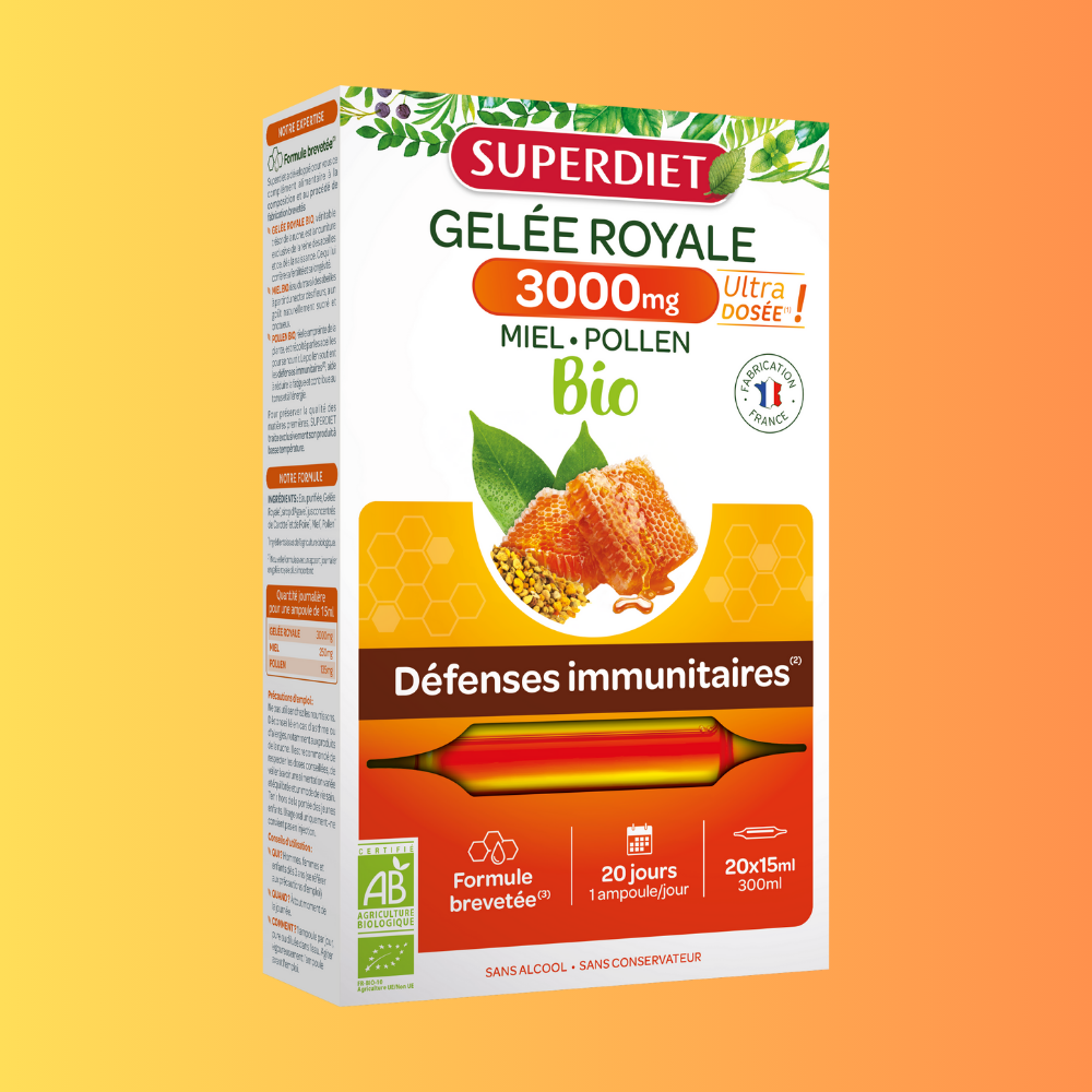 Cutie bio supliment imunitate cu lăptișor de matcă și polen, fundal portocaliu.