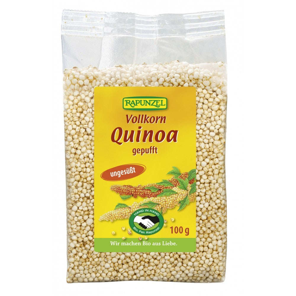 Quinoa integrală expandată Rapunzel 100g, ambalată, etichetă galbenă cu detalii verzi și roșii.