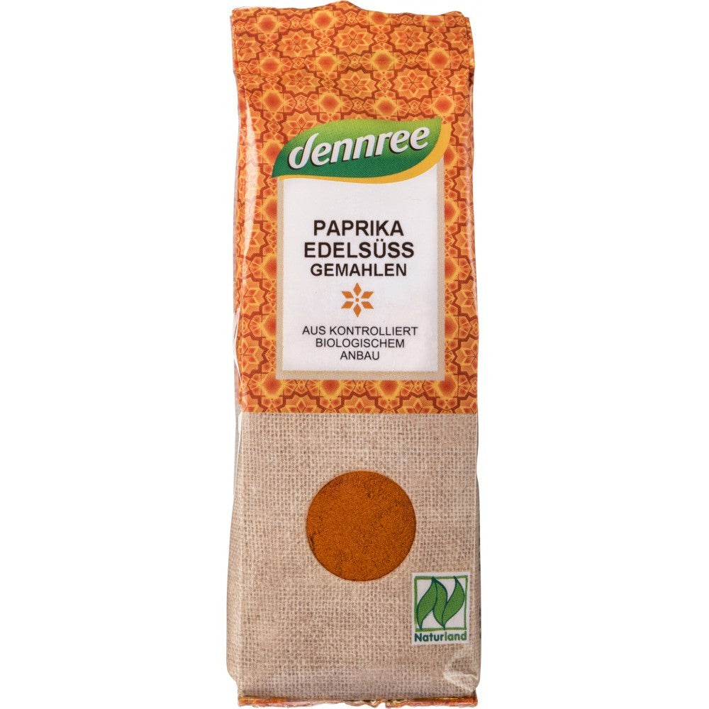 Boia bio de ardei dulce Dennree 70g, ambalaj cu model portocaliu, etichetă albă.