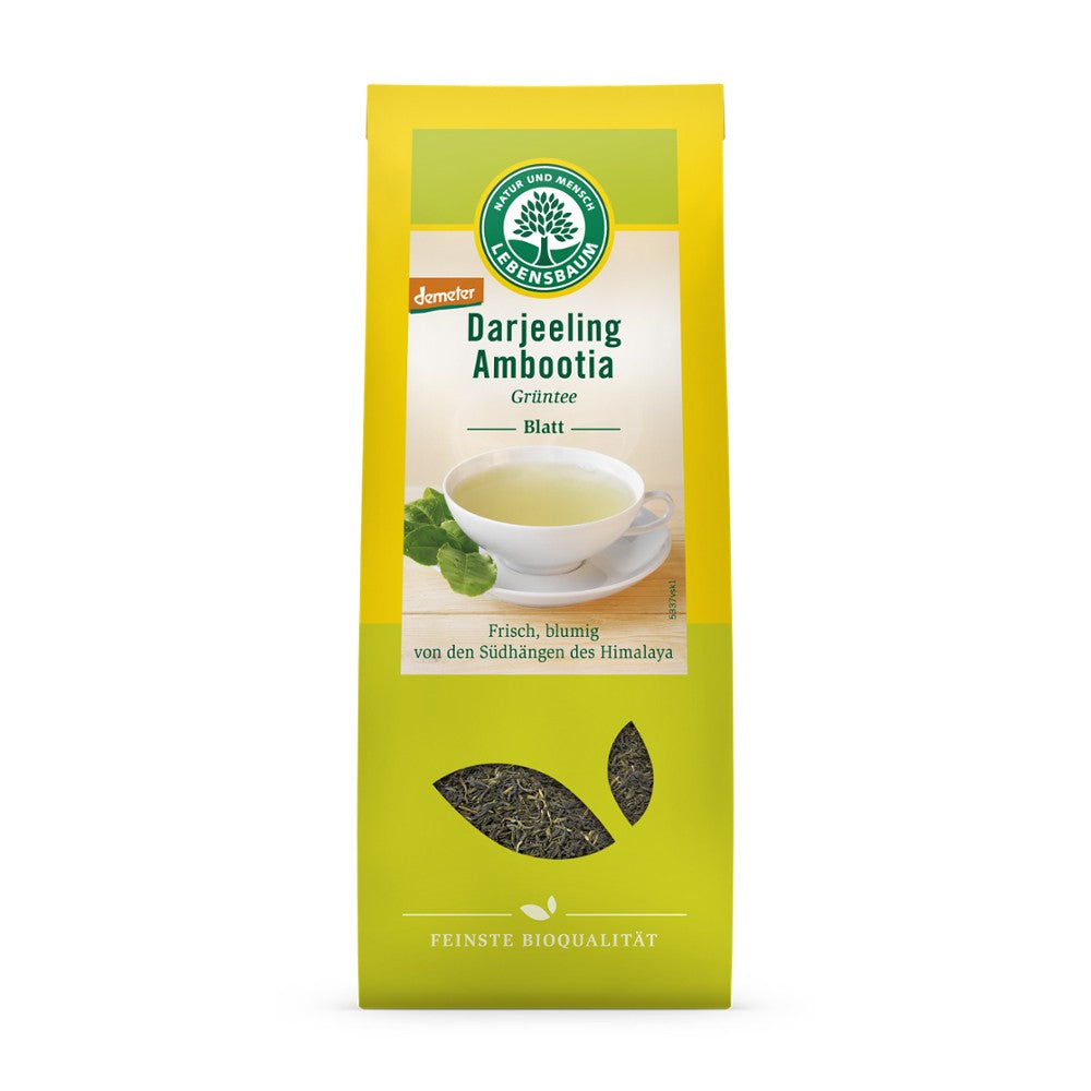 Pungă galbenă ceai verde Darjeeling bio Demeter 50g Lebensbaum, imagine cană cu ceai.
