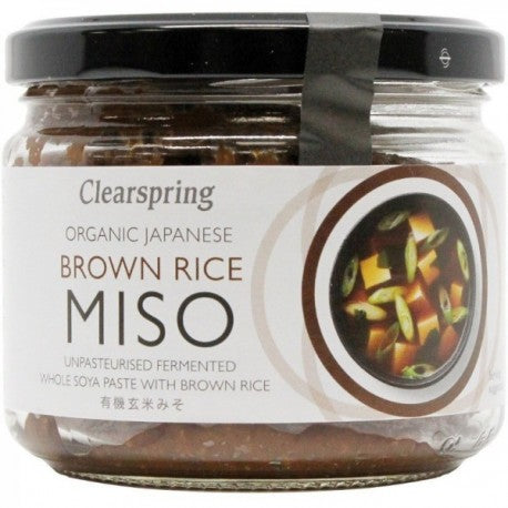 Miso orez brun nepasteurizat Clearspring într-un borcan de sticlă, etichetă albă cu text și design japonez.