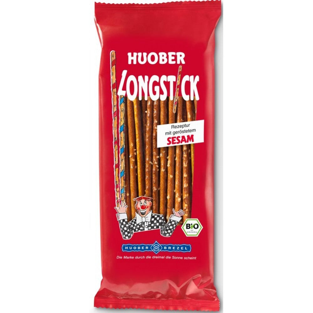 Sticksuri lungi bio Huober 150g, susan prăjit, ambalaj roșu atractiv.