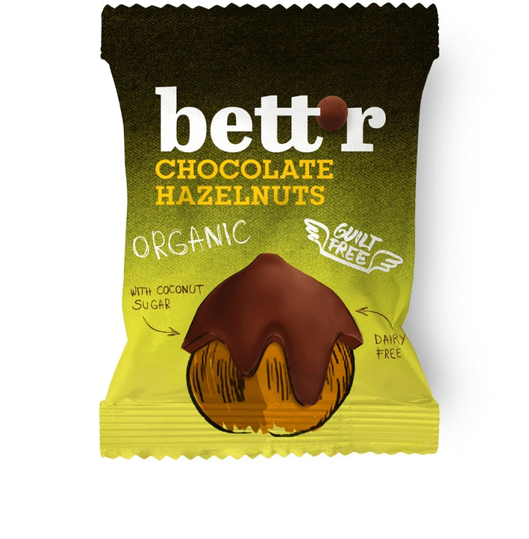Alune de pădure învelite în ciocolată eco Bettr 40g, ambalaj galben-verzui, fără lactoză.