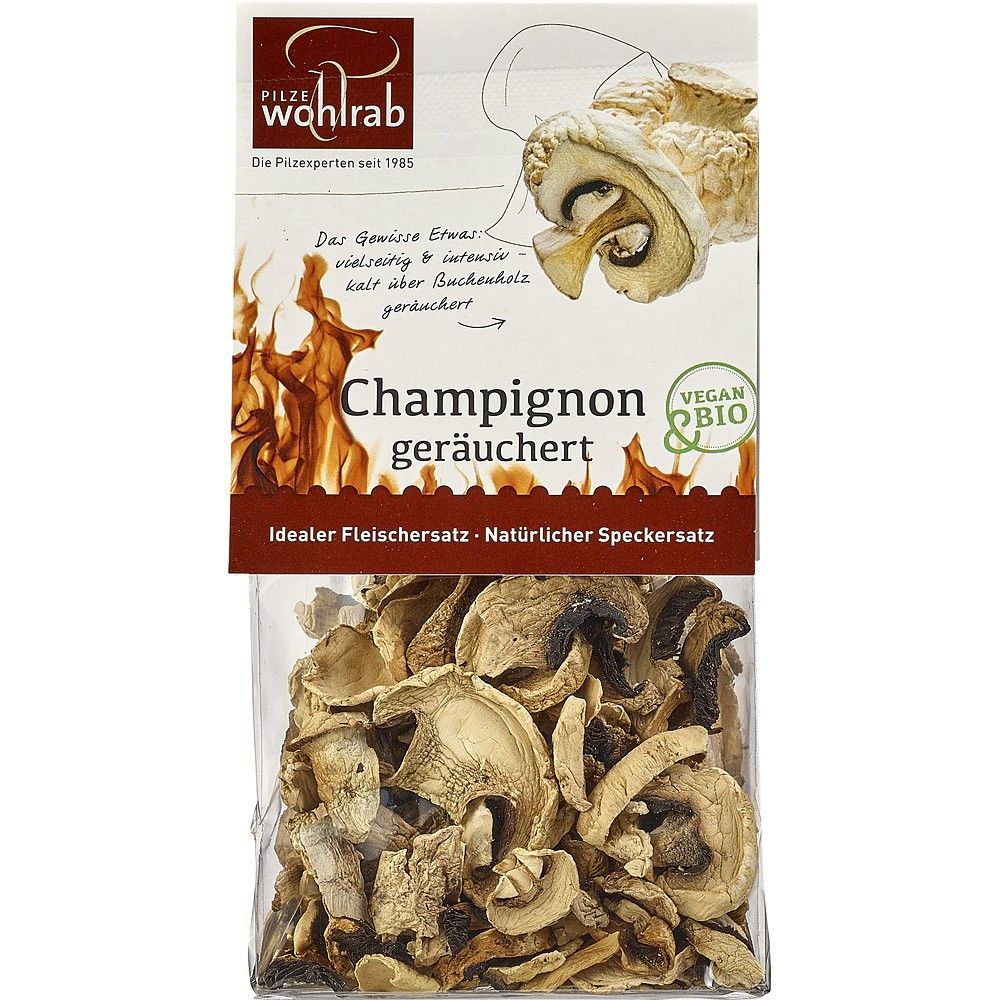 Ciuperci champignon bio deshidratate și afumate Wohlrab, pachet 20g, ambalaj transparent și etichetă colorată.