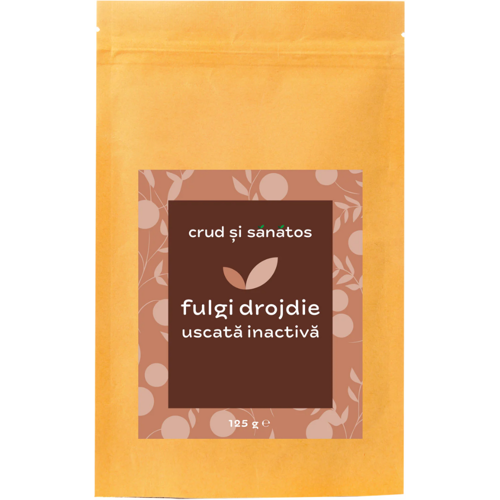 Fulgi de drojdie inactivă 250g, ambalaj maro cu detalii albe și frunze stilizate.