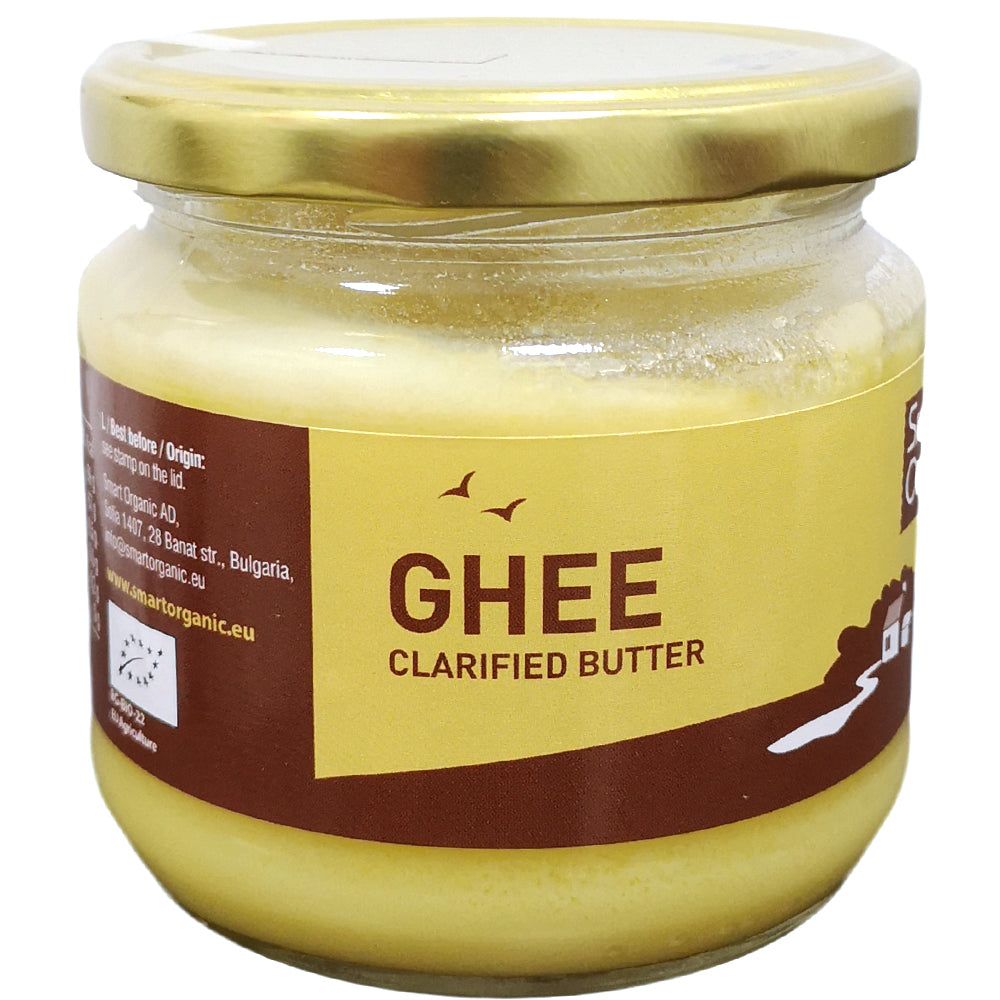 Ghee eco 270g Smart Organic, borcan sticlă, etichetă galbenă și capac metalic auriu.