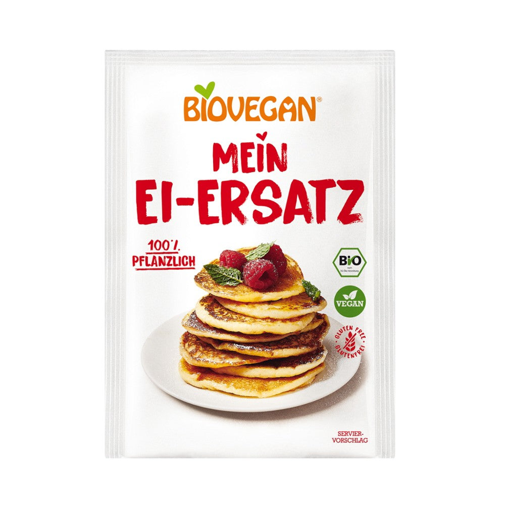 Pachet Biovegan înlocuitor vegetal bio de ouă, 20g, ambalaj alb cu imagine clătite și text roșu.