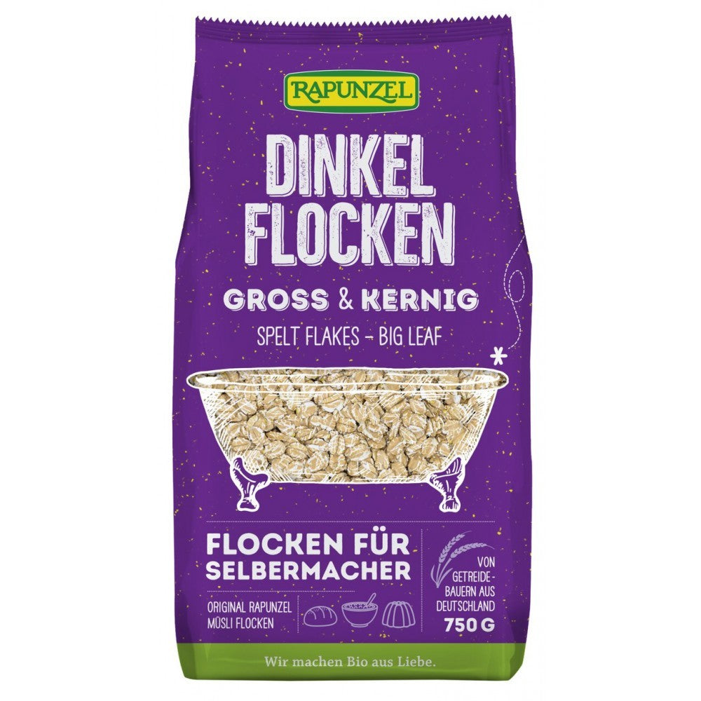 Fulgi mari de spelta bio Rapunzel 750g, ambalaj mov și verde, textură crocantă.