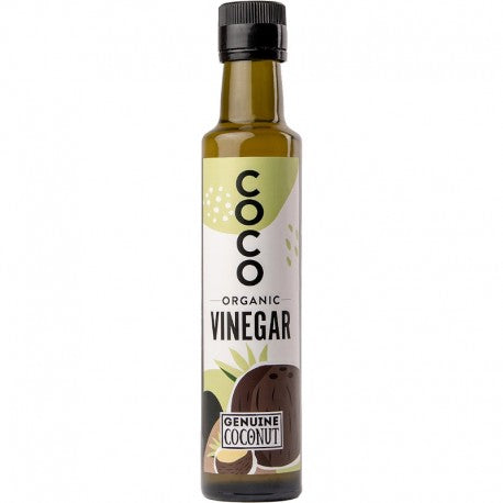 Oțet de cocos bio Genuine Coconut 250ml, sticlă cu etichetă verde și negru, ingrediente Sri Lanka.