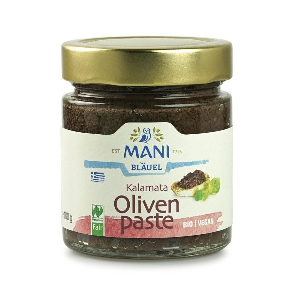 Pasta de măsline vegană bio Mani 180g în borcan cu capac auriu, etichetă albă.