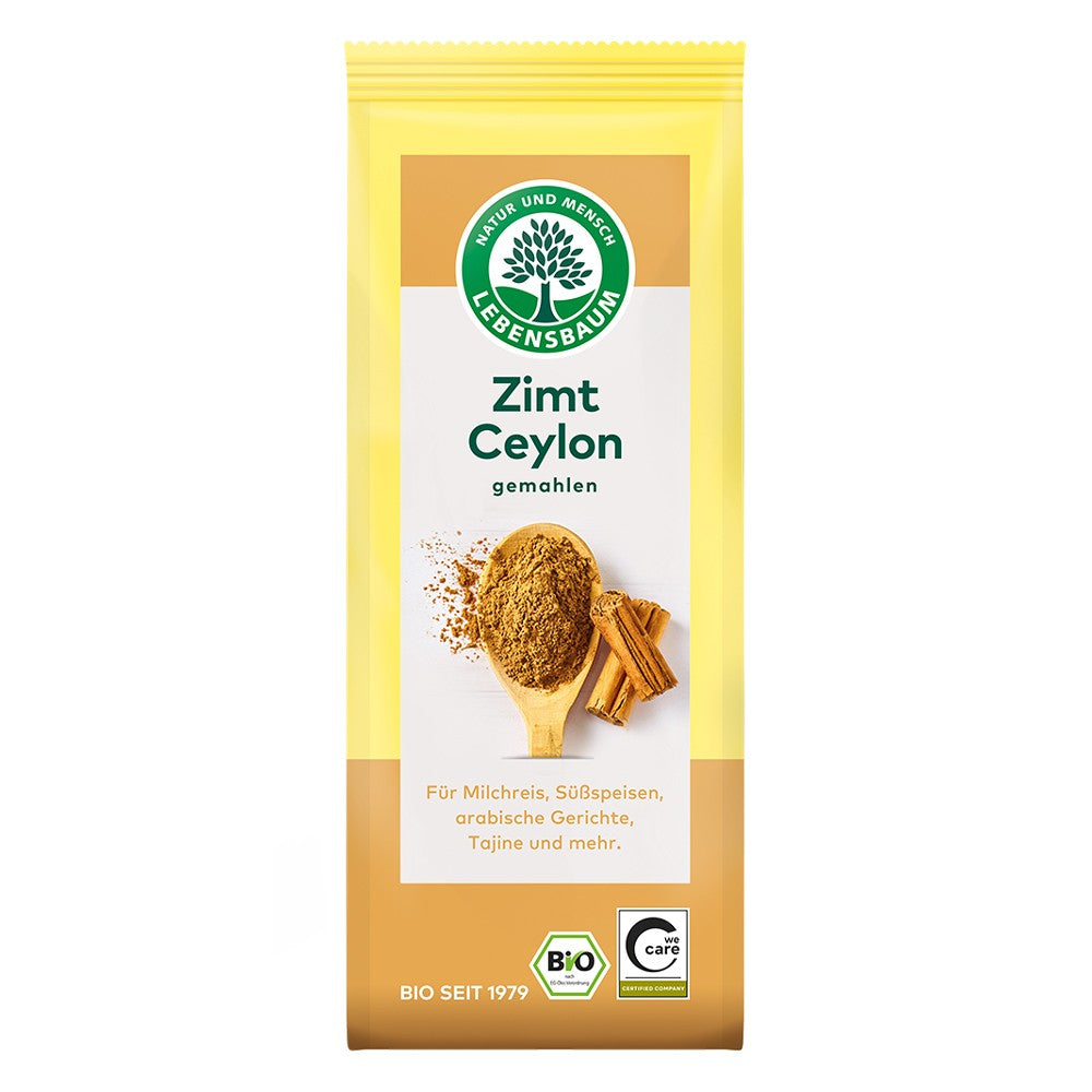 Scorțișoară de Ceylon măcinată bio 50g Lebensbaum, ambalaj galben-verde, lingură lemn.