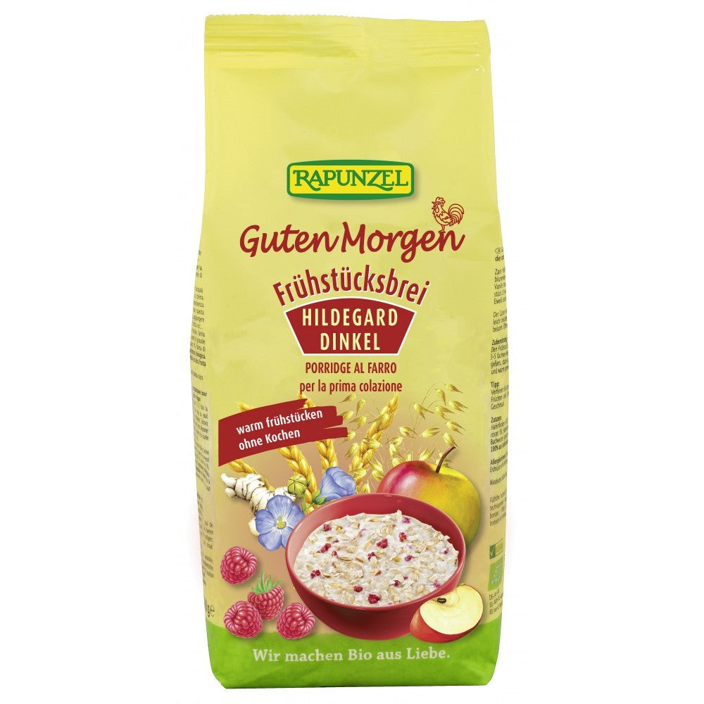 Pachet galben Terci de spelta Hildegard cu cereale, fructe și flori pe ambalaj.